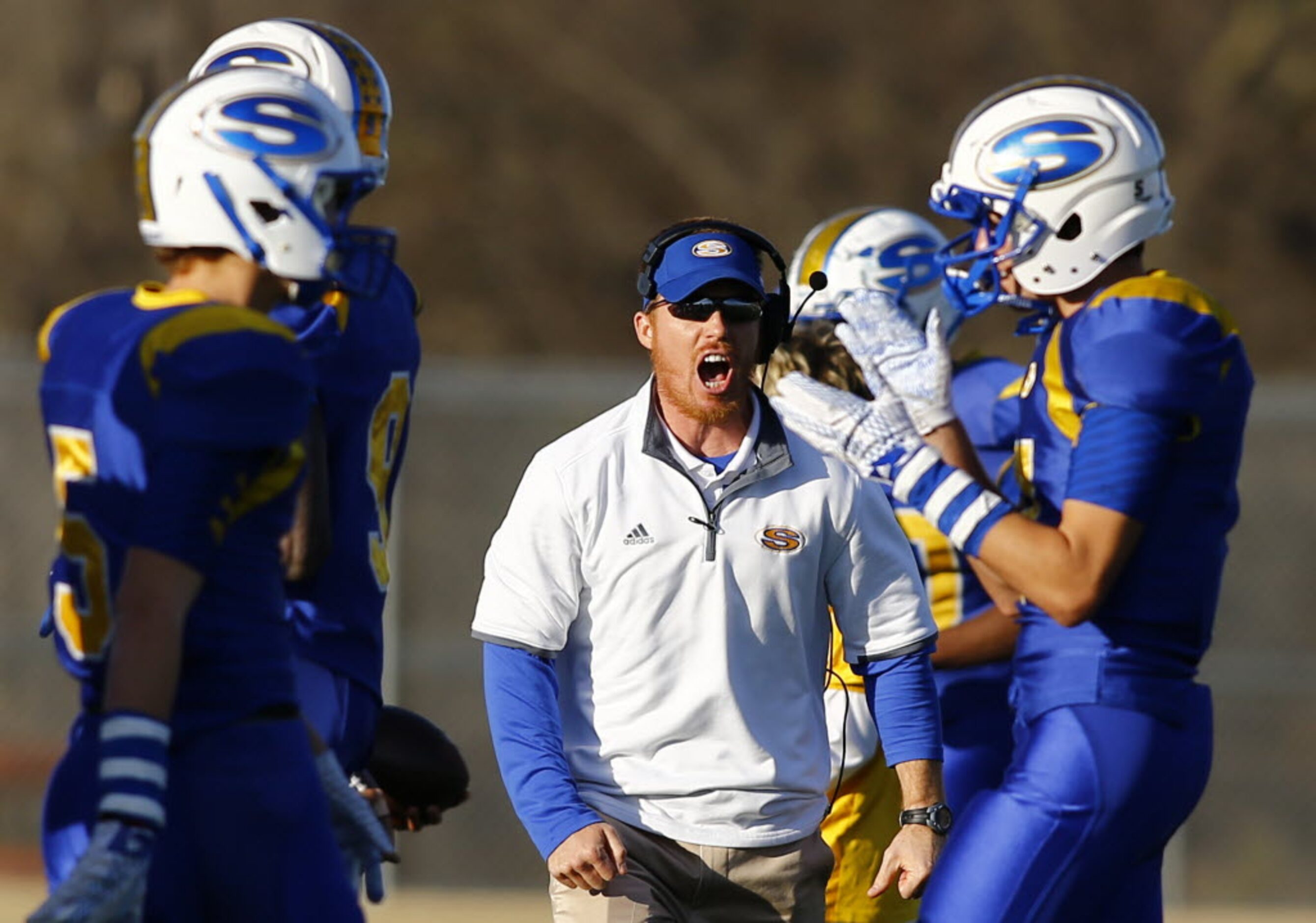 TXHSFB The Sunnyvale bench reacts after stopping Mineola's on downs in their state...