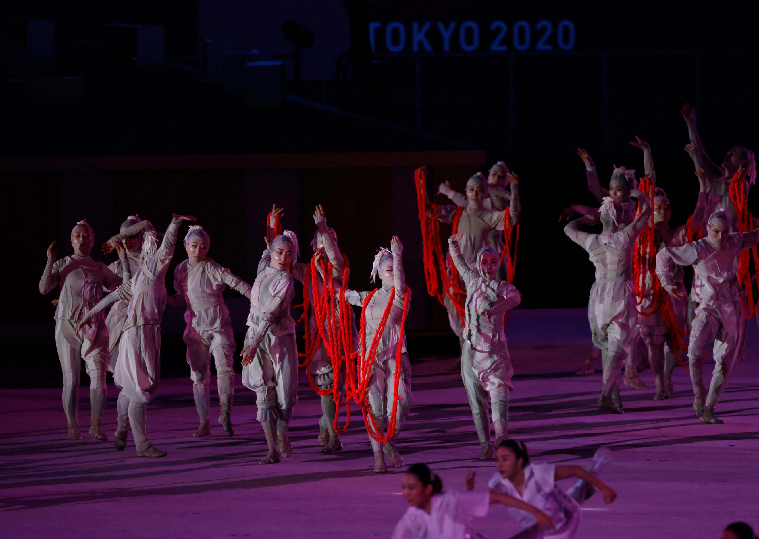 Entertainers performs during the opening ceremony for the postponed 2020 Tokyo Olympics at...