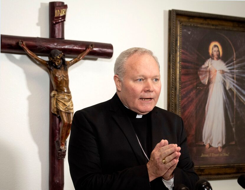 Bishop Edward Burns addresses the media during a press conference at St. Cecilia's on...