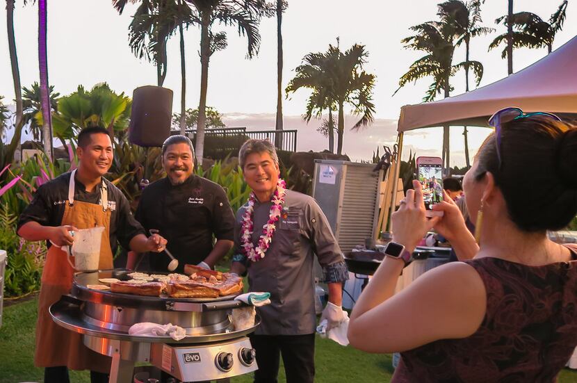 Hawaiian chef Roy Yamaguchi (right) is a founder of the Hawaii Food & Wine Festival and a...