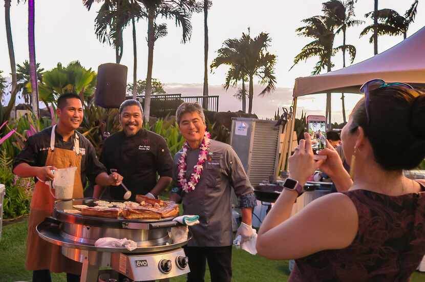Hawaiian chef Roy Yamaguchi (right) is a founder of the Hawaii Food & Wine Festival and a...
