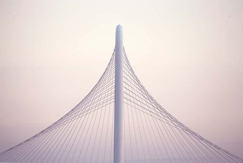 The Margaret Hunt Hill Bridge spans the Trinity River between downtown and West Dallas,...