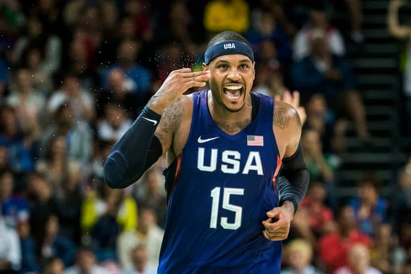 Carmelo Anthony (15) of the United States celebrates after hitting a basket during a men's...