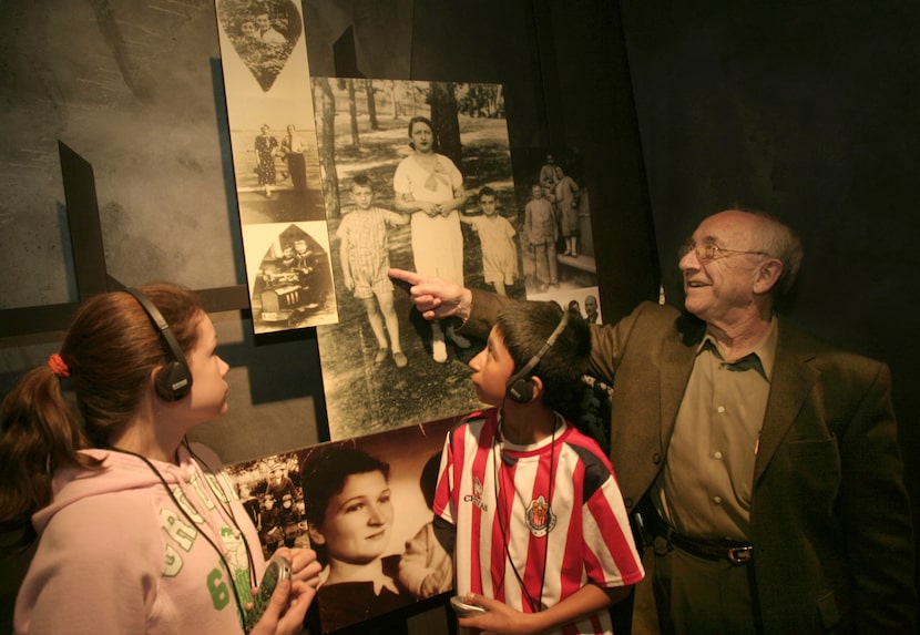 Max Glauben, right, points to himself in a family photo prior to the war, to Little Elm...