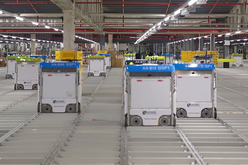 Robots on a grid at an Ocado fullfilment center in the U.K. where the company has about...