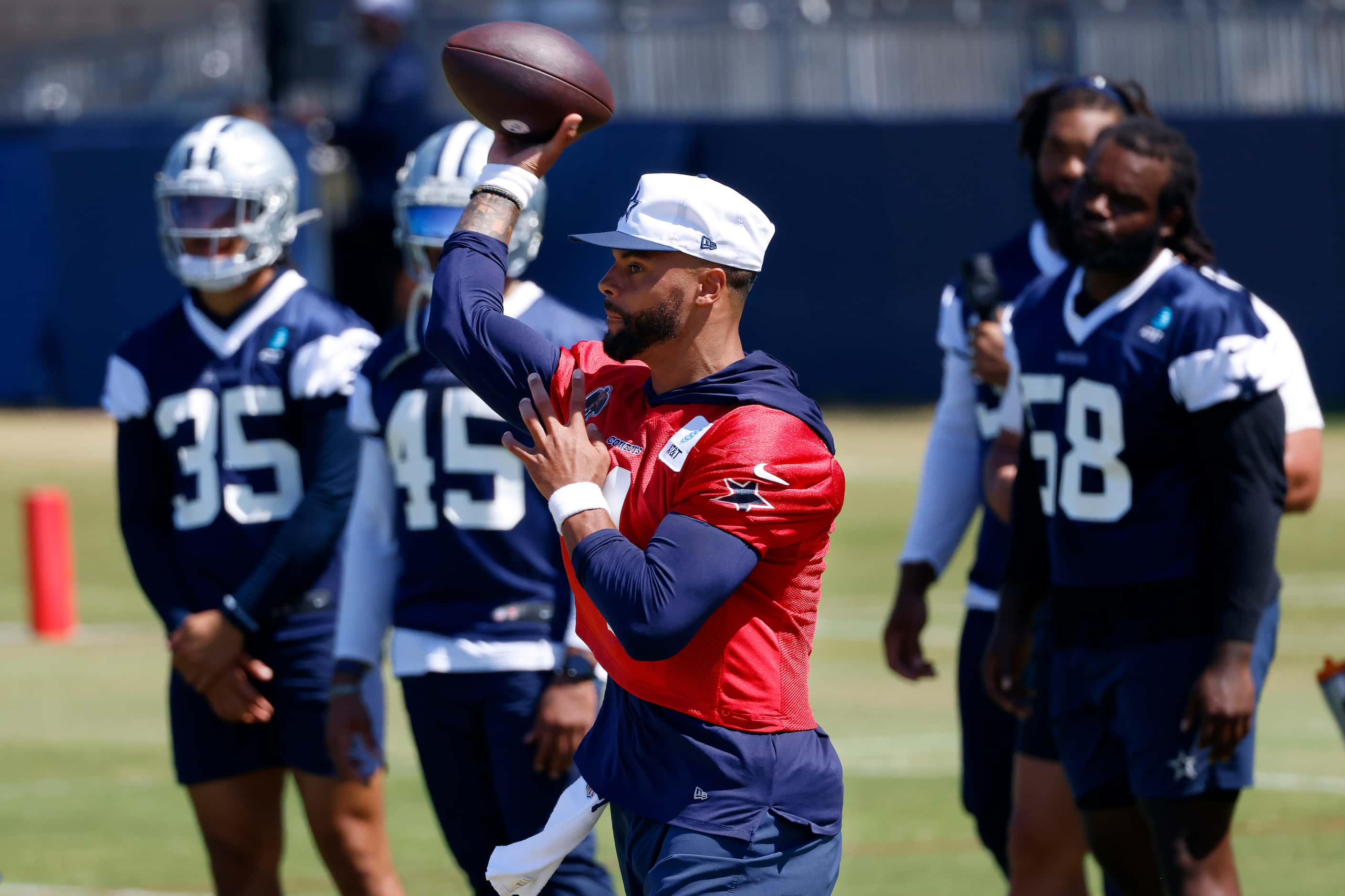 Dallas Cowboys quarterback Dak Prescott (4) tosses a pass during a mock game workout  in...