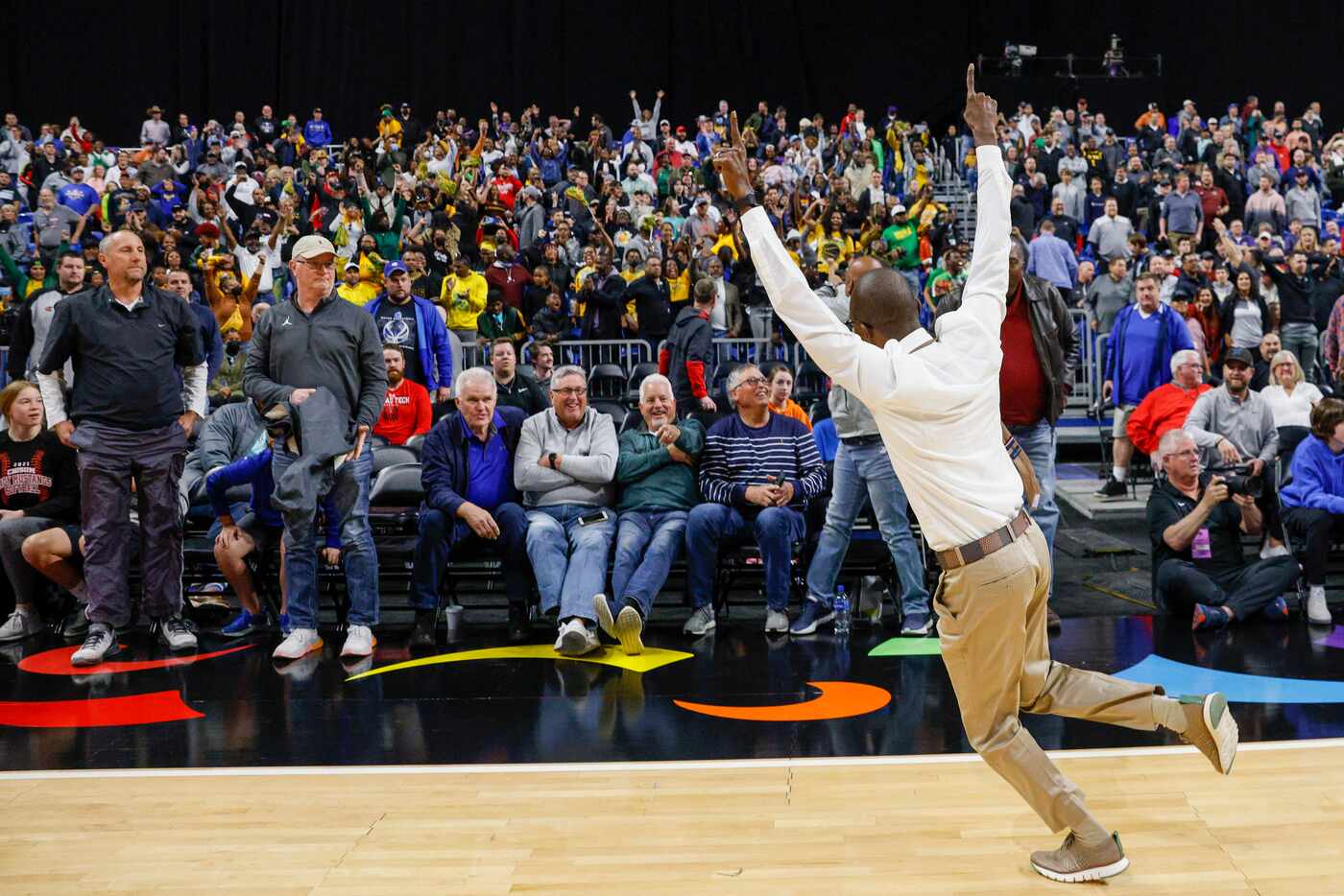 Madison head coach Damien Mobley celebrates winning the Class 3A state championship game...