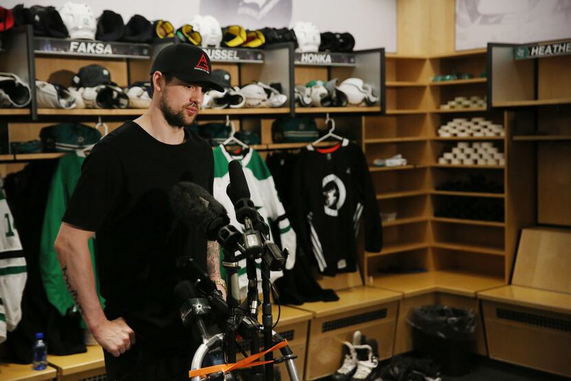 Dallas Stars forward Jamie Benn speaks during a press conference following the conclusion of...