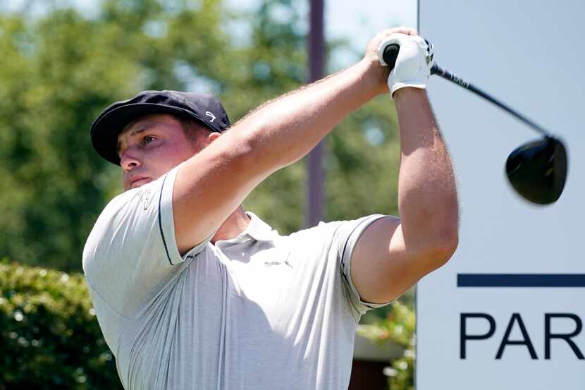 PGA Tour golfer Bryson DeChambeau tees off to start his third round of the Charles Schwab...