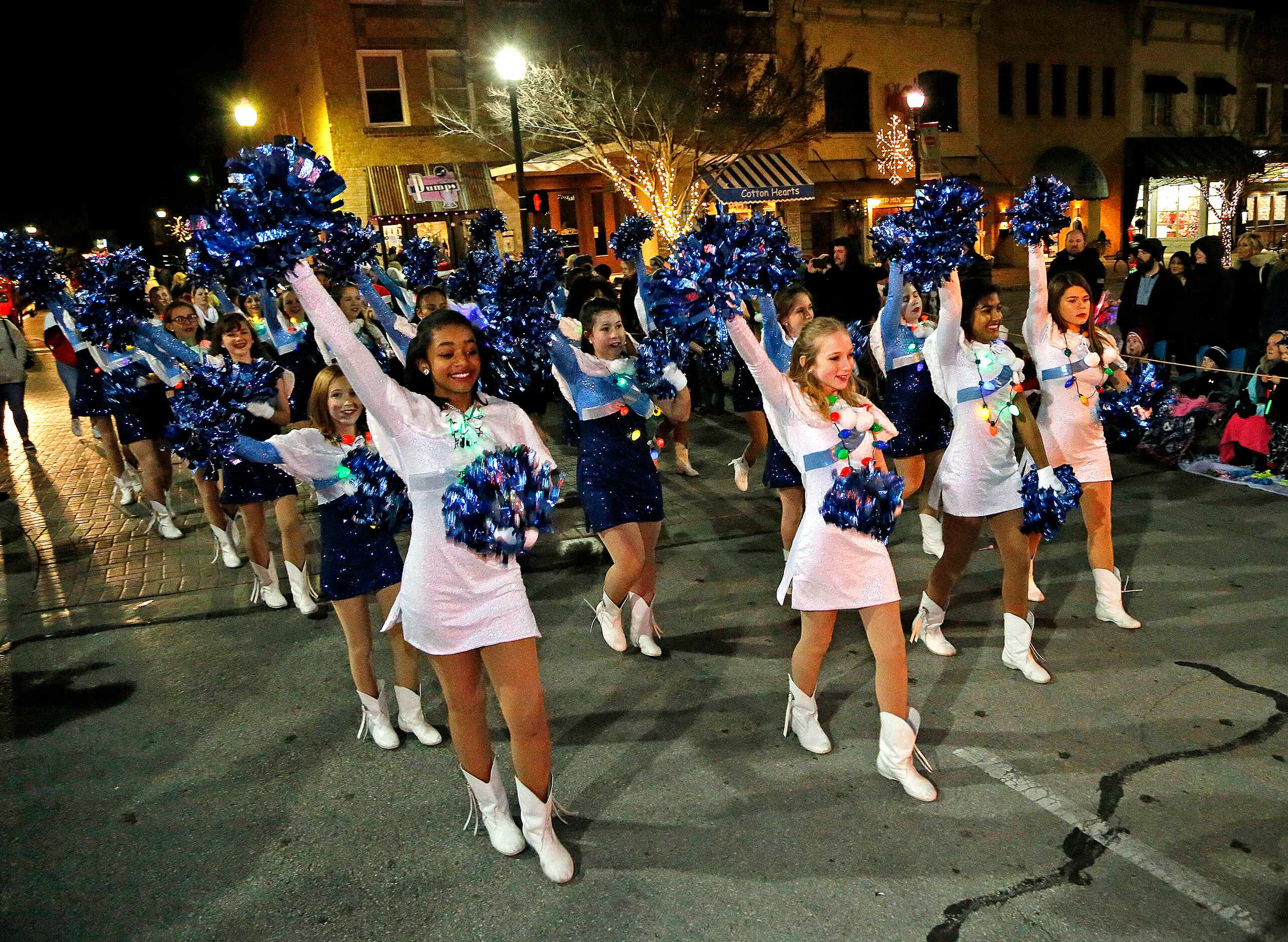 The Evans Middle School Pantherettes drill team marches during the McKinney Christmas Parade...