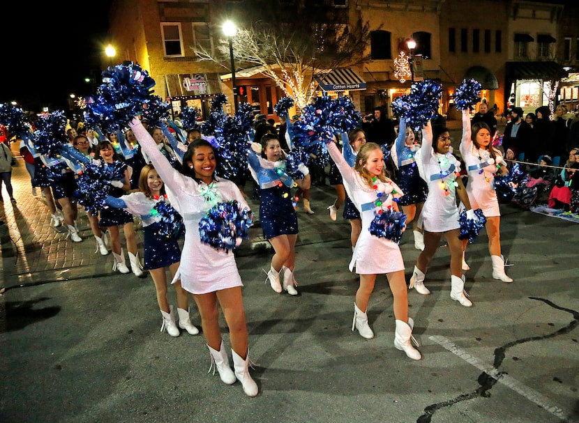 The Evans Middle School Pantherettes drill team marches during the McKinney Christmas Parade...