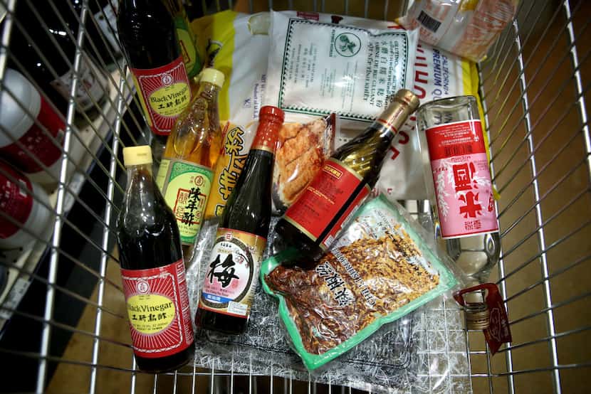 Asian ingredients in a cart at Jusgo Supermarket in Plano  (Rose Baca/Staff Photographer)