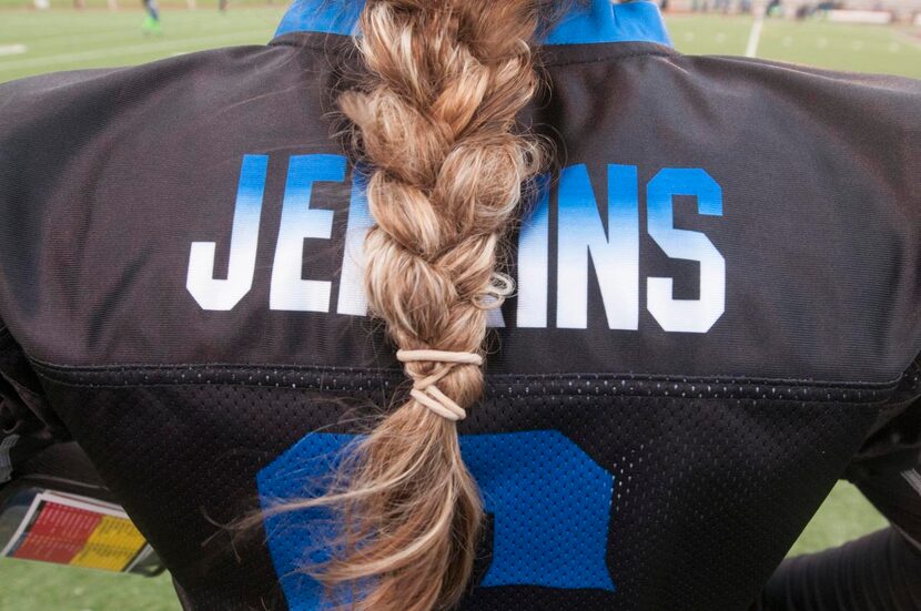 
Amanda Jenkins, wide receiver for the Dallas Elite women's football team, watches a play...