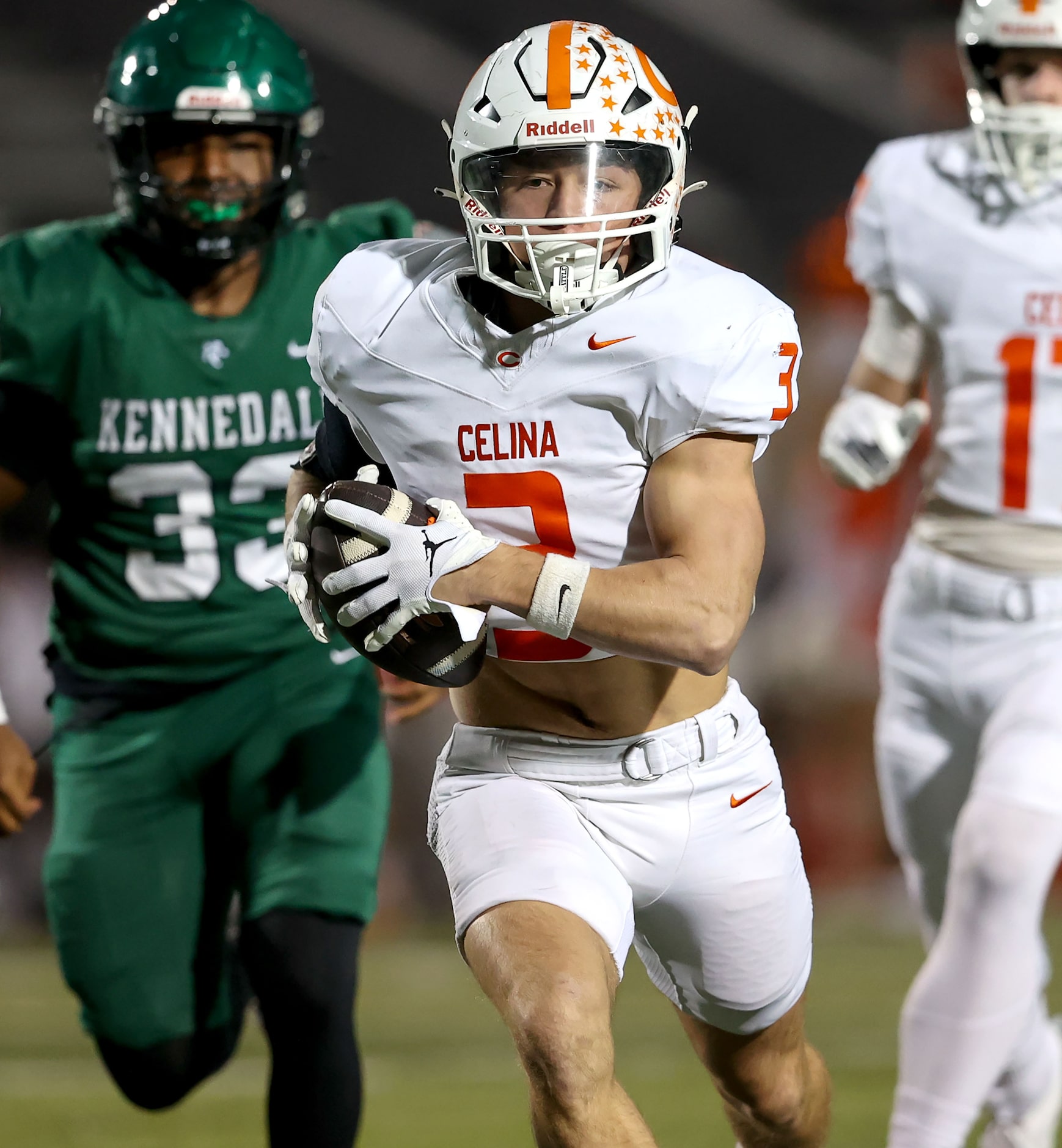 Celina running back Logan Gutierrez (3) makes a nice gain against Kennedale during the first...