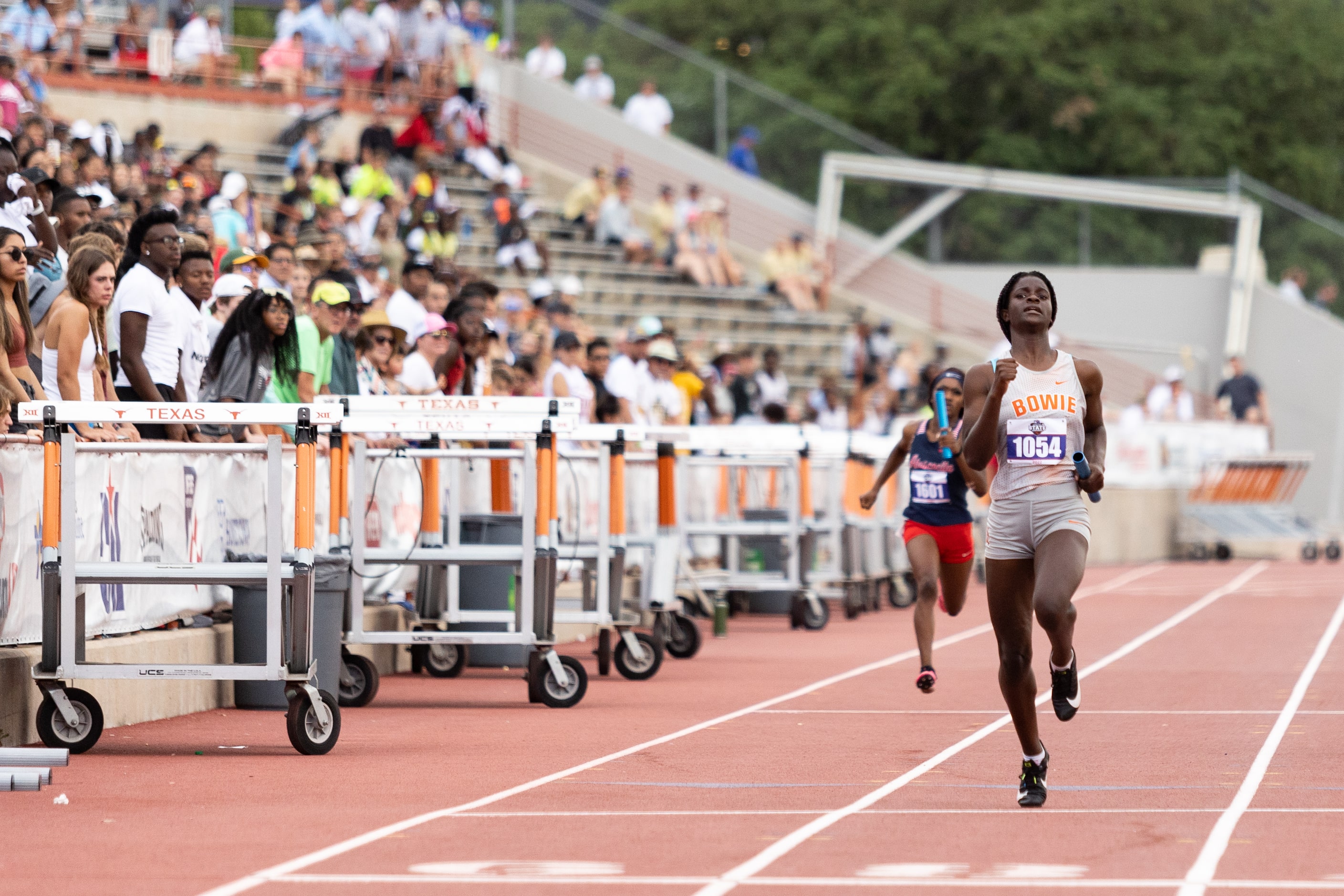 Bailey Johnson of Arlington Bowie races to the finish in the girls’ 4x200-meter relay at the...