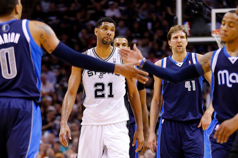 San Antonio Spurs forward Tim Duncan (21) has stunned look on his face as the Dallas...