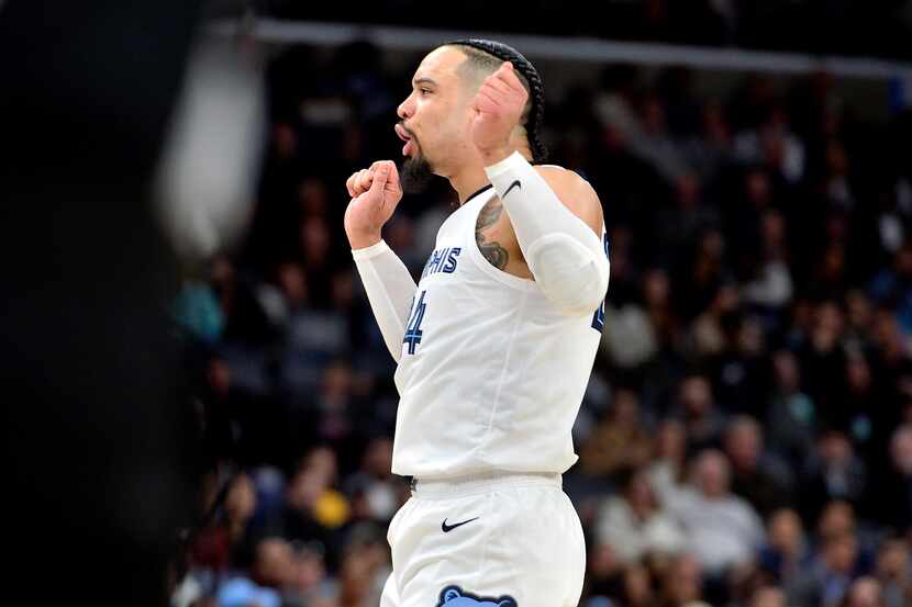 Memphis Grizzlies forward Dillon Brooks (24) gestures toward Dallas Mavericks players in the...