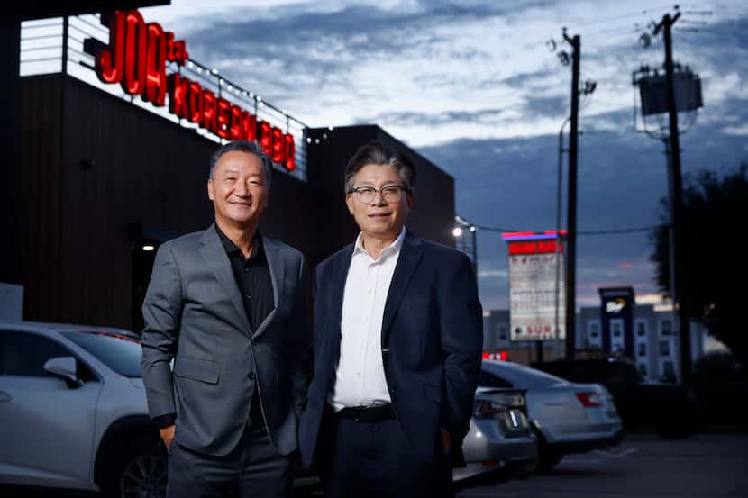 John Lee (left) and Hyun Kyum Kim, two members of the Greater Dallas Korean American Chamber...