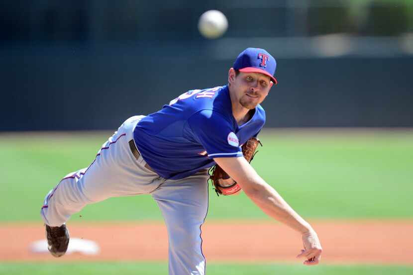 Mar 29, 2015; Phoenix, AZ, USA; Texas Rangers starting pitcher Nick Tepesch (23) pitches...