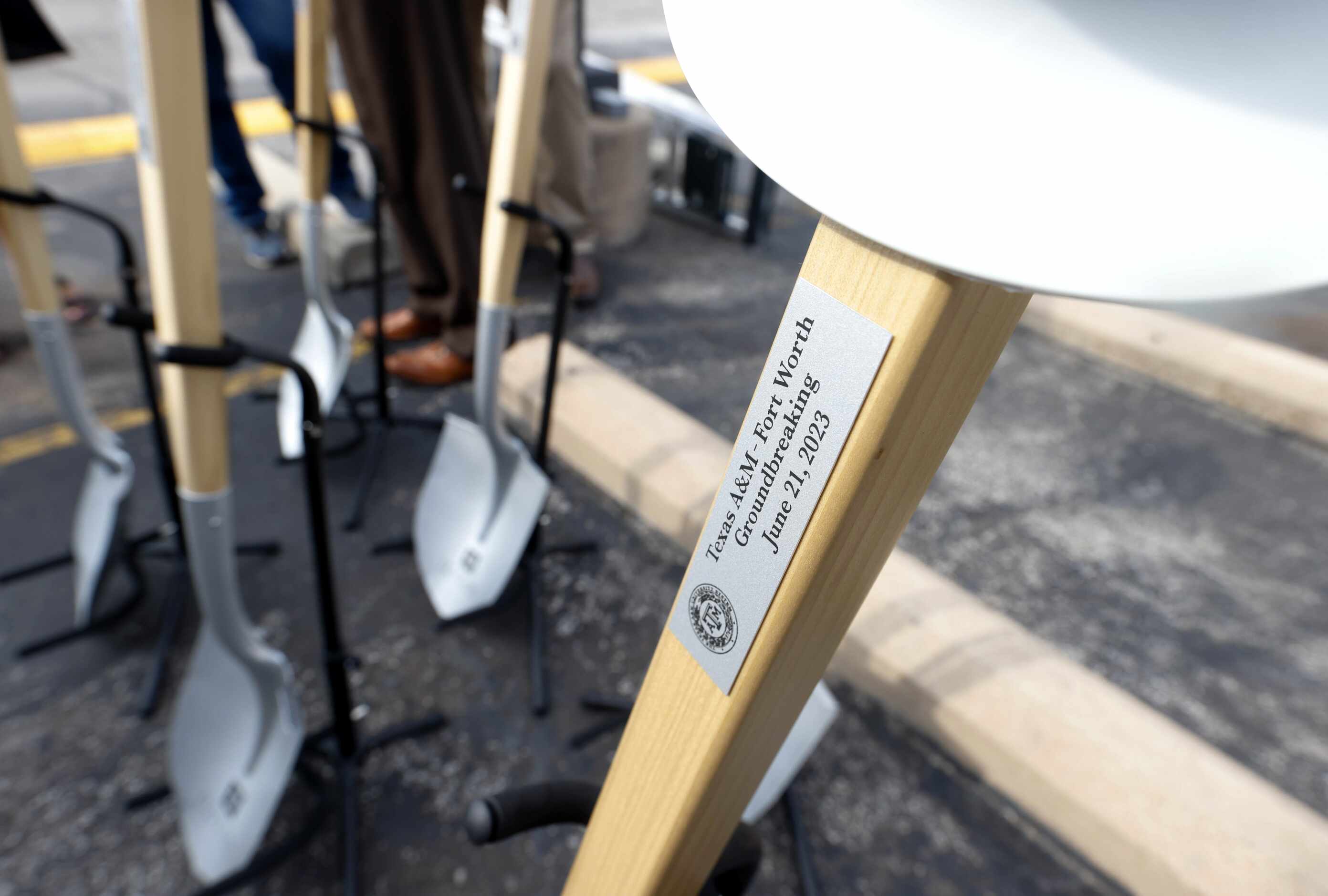 Ceremonial shovels and helmets sit near the stage for a groundbreaking ceremony for Texas...