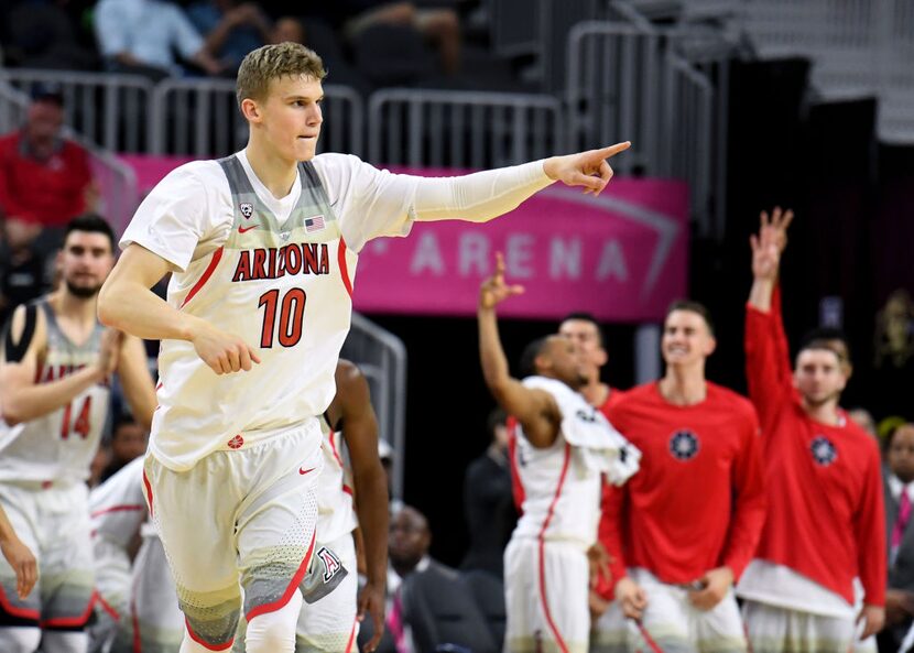 LAS VEGAS, NV - MARCH 09:  Lauri Markkanen #10 of the Arizona Wildcats gestures after...