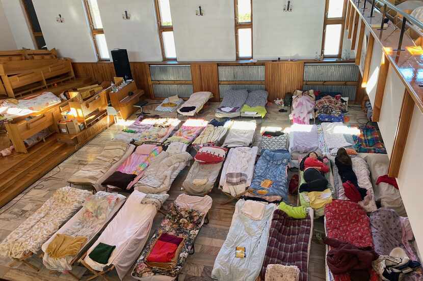 Beds lined up at a church in Chelm, Poland,  15 miles from the Ukrainian border, which has...