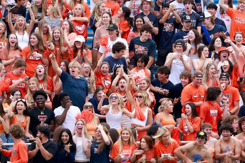 Frisco Wakeland fans celebrate a goal during the second half of the Class 5A girls soccer...