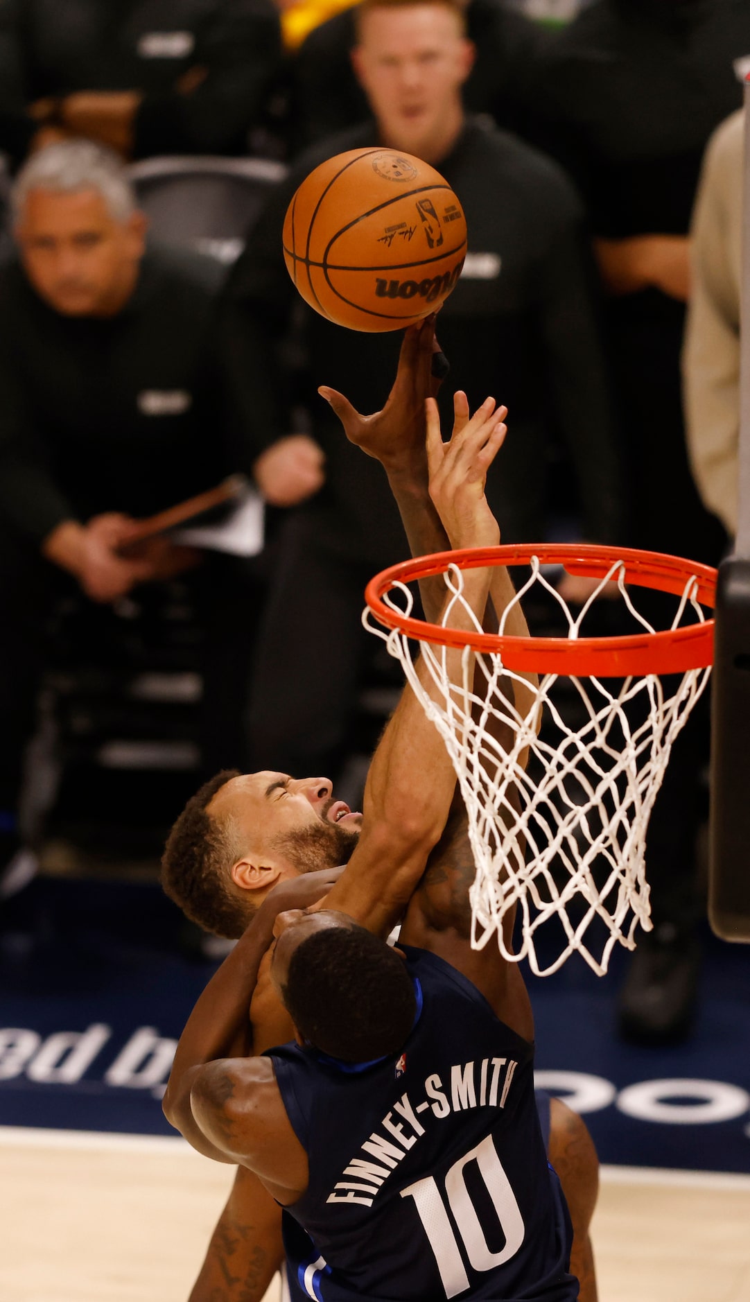 jDallas Mavericks forward Dorian Finney-Smith (10) fouls Utah Jazz center Rudy Gobert (27)...