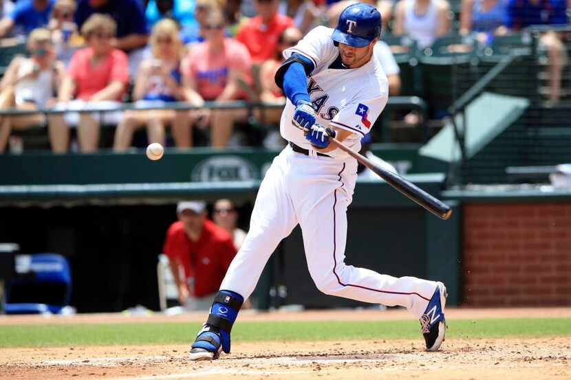 Jun 14, 2015; Arlington, TX, USA; Texas Rangers third baseman Joey Gallo (13) hits a home...