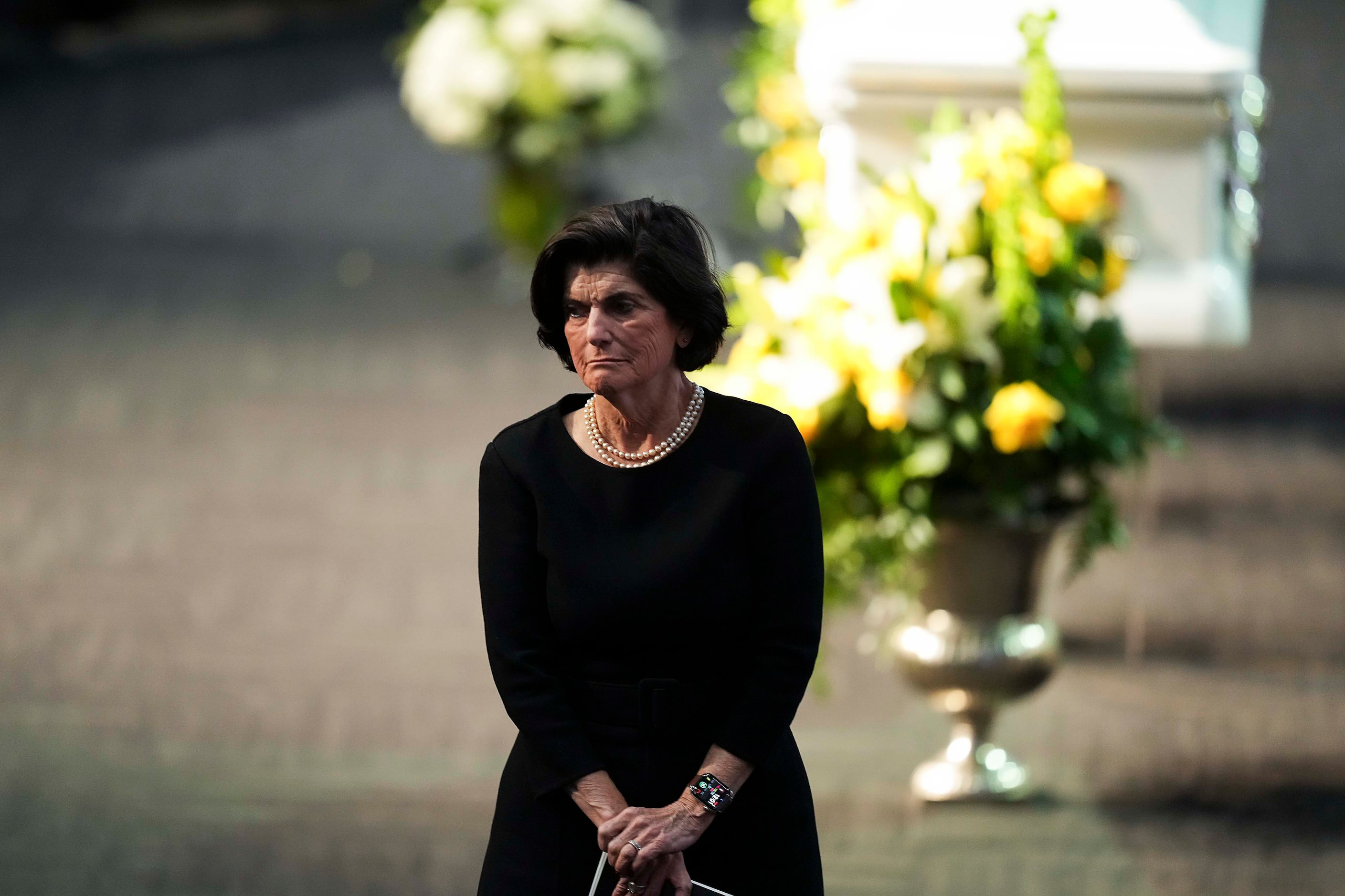 Luci Baines Johnson, daughter of former President Lyndon Baines Johnson, walks away from the...