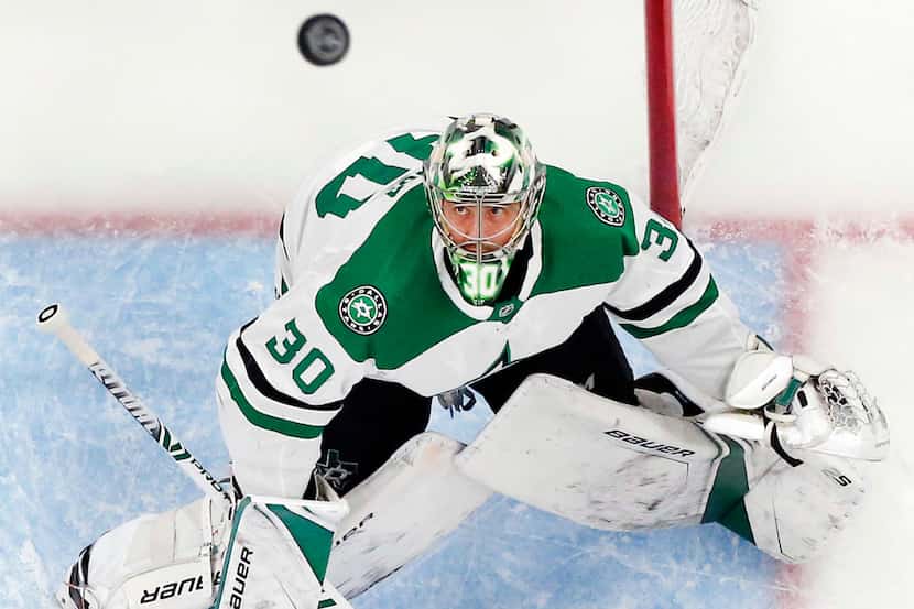 Dallas Stars goaltender Ben Bishop (30) eyes the puck during a game against the St. Louis...
