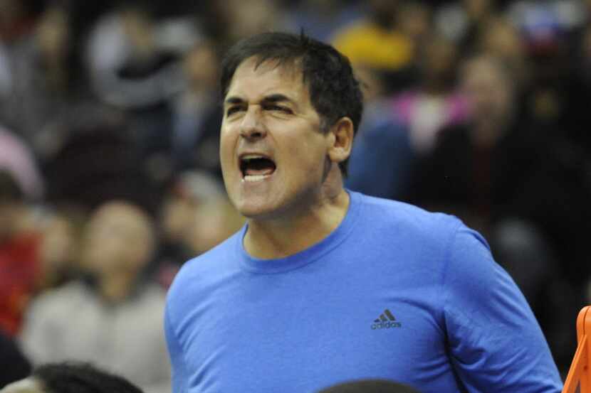 Jan 20, 2014; Cleveland, OH, USA; Dallas Mavericks owner Mark Cuban reacts in the fourth...