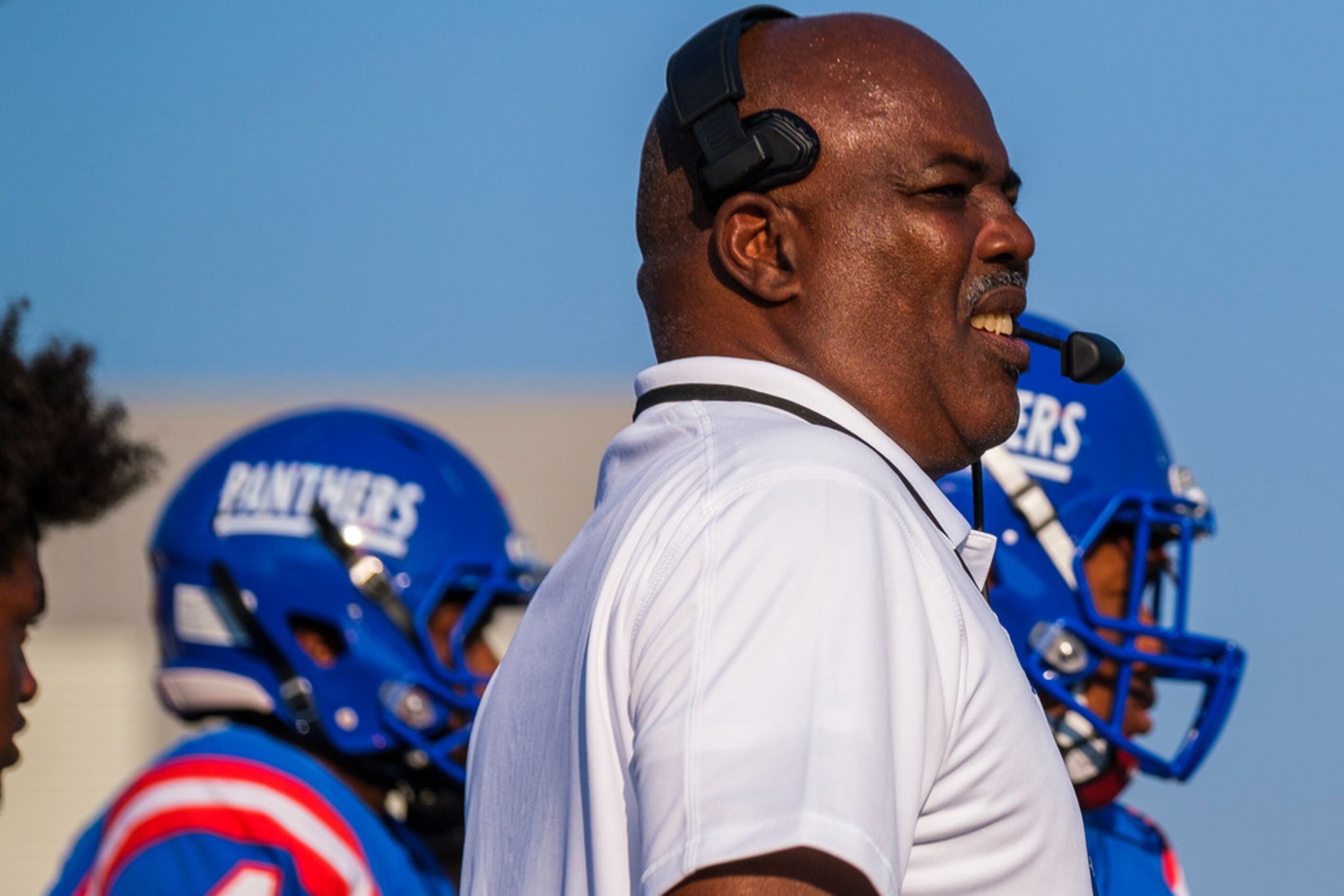 Duncanville head coach Reginald Samples watches from the sideline during the first half of a...