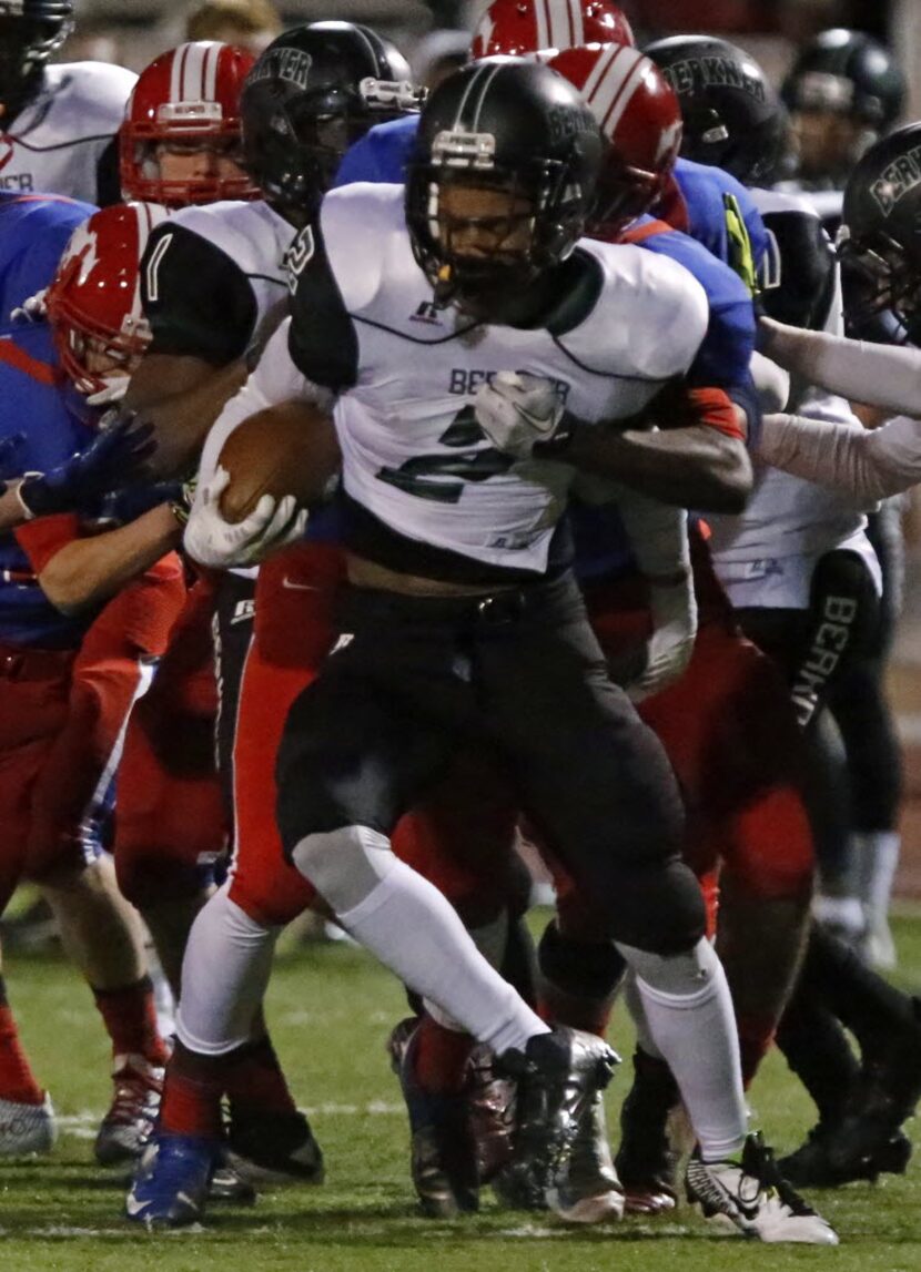 Berkner slot receiver Terance Hargest (2) is bottled up by the Pearce defense during the...