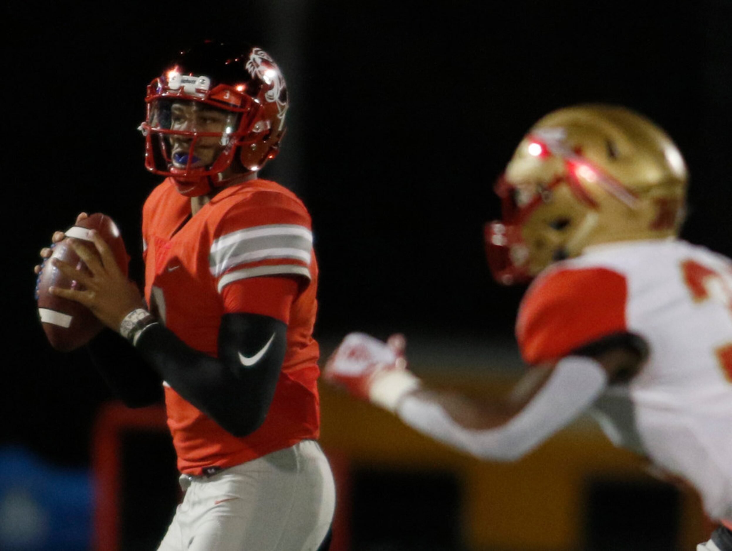 Duncanville quarterback Ja'Quinden jackson (3) looks for a receiver during first quarter...