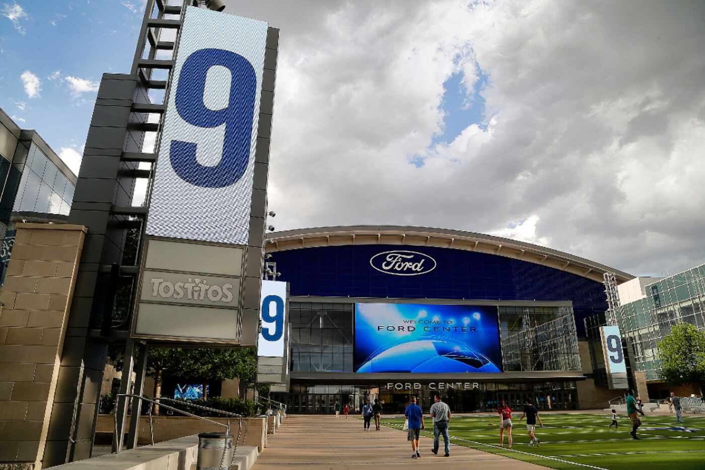 Tony Romoâs number was put on the screens at Tostitos Plaza in front of The Ford Center at...