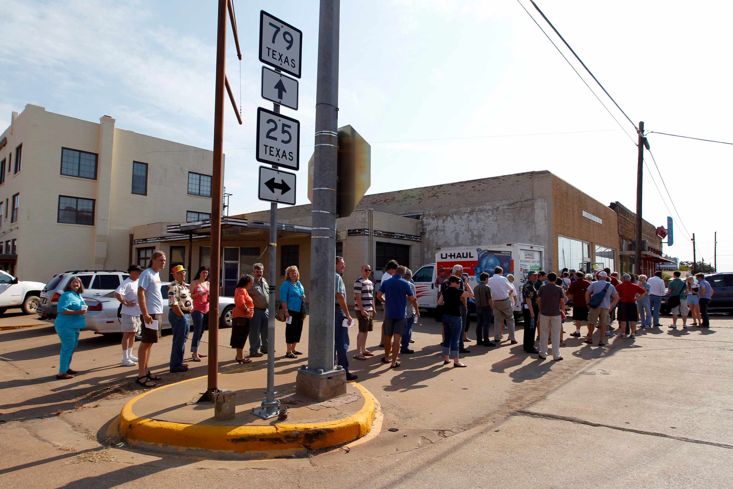 Book buyers lined up to bid on Larry McMurtry's private collection of books in downtown...