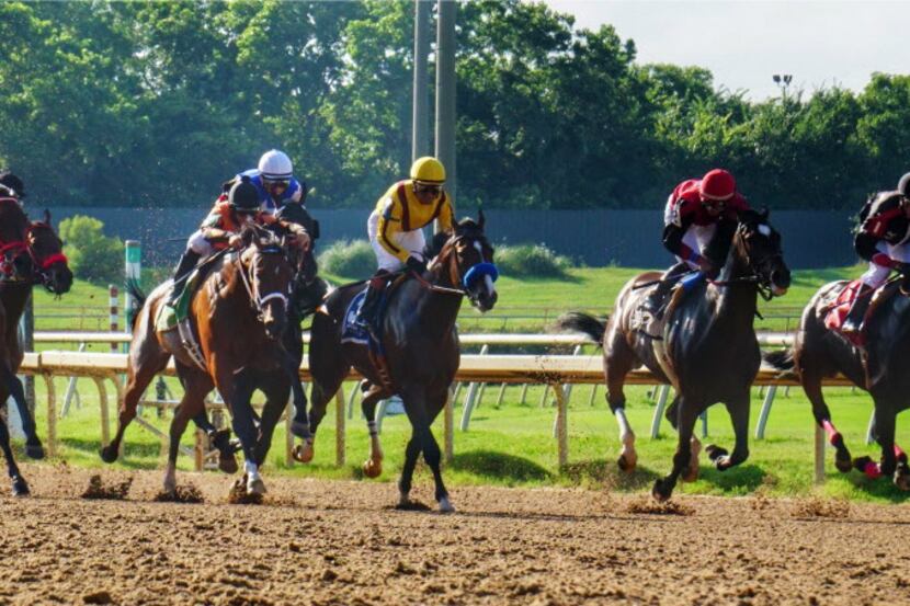 Jockeys raced at the Lone Star Park Handicap in May at the track in Grand Prairie. (Lawrence...