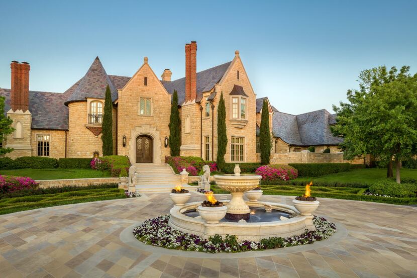 This seven-bedroom estate at 9806 Inwood Road in Dallas includes a 10-car garage, according...