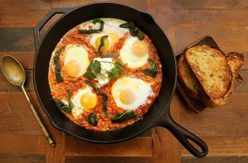 Eggs poached in spiced tomato-harissa sauce