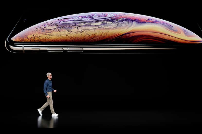 Apple CEO Tim Cook speaks about the Apple iPhone XS at the Steve Jobs Theater during an...