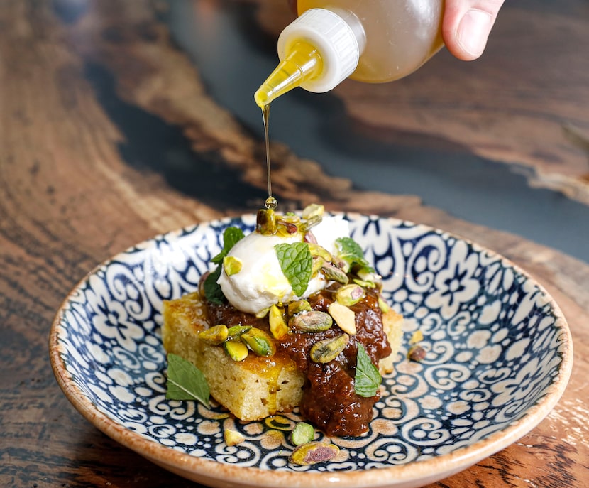 Anise offers an olive oil cake with fig jam, whipped mascarpone, pistachios and a mint garnish.