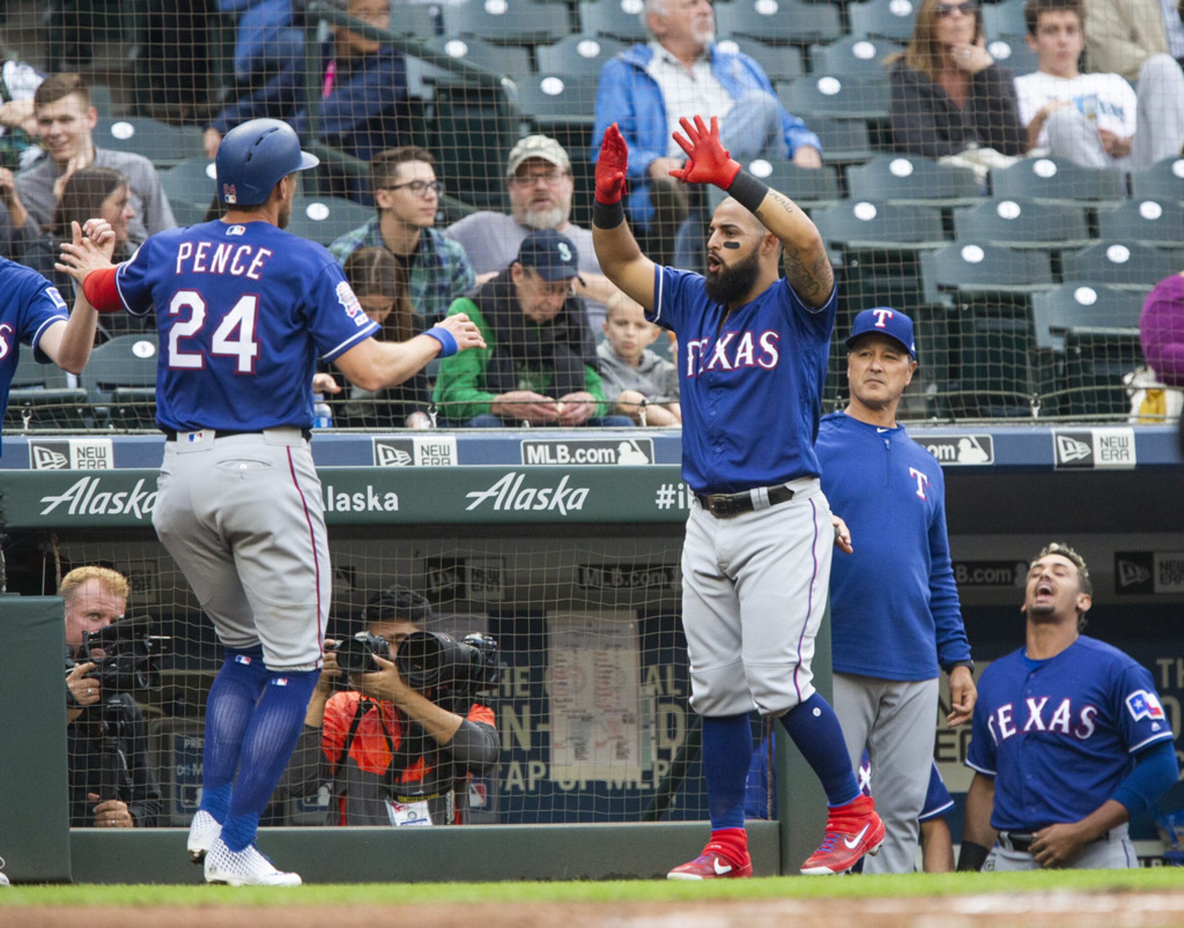 SEATTLE, WA - MAY 28:  Hunter Pence #24 of the Texas Rangers is greeted by Rougned Odor #12...