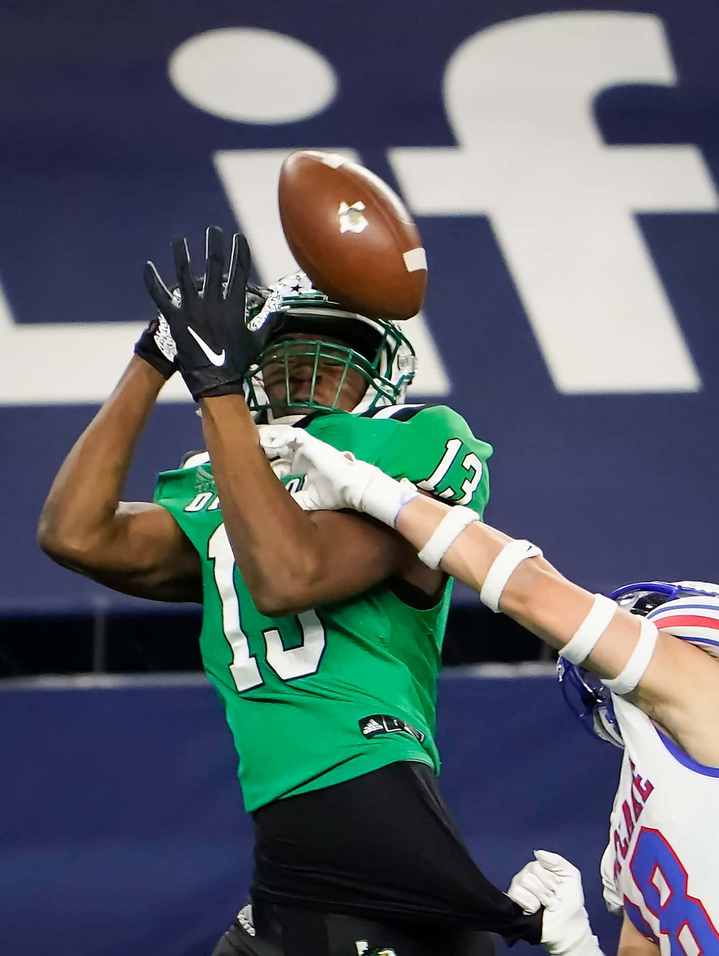 Austin Westlake defensive back Ford Dickerson breaks up a pass intended for Southlake...