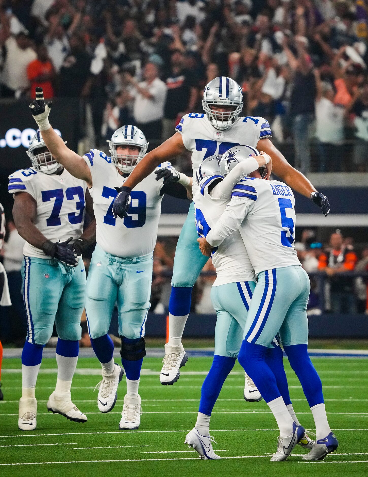 Dallas Cowboys place kicker Brett Maher (19) celebrates with punter Bryan Anger (5) after...