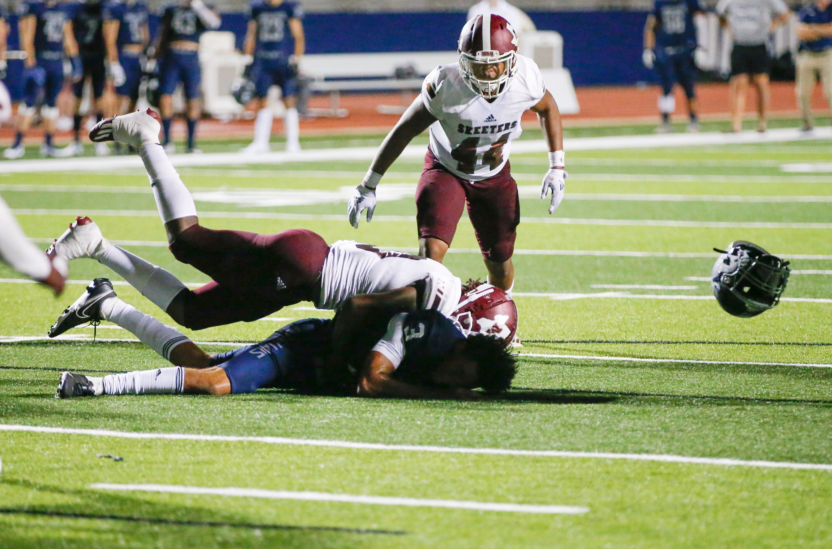 Mesquite senior linebacker Josh Williams (10) tackles Flower Mound senior quarterback Nick...