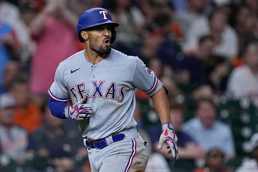Texas Rangers' Marcus Semien yells at Houston Astros starting pitcher Framber Valdez after...