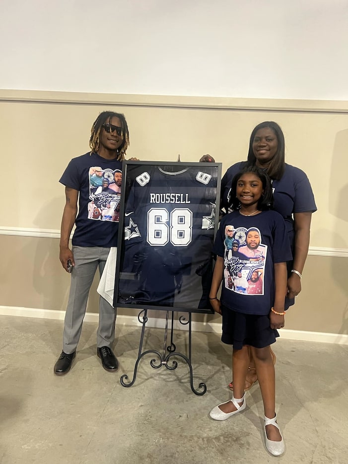 Terrell Roussell's Cowboys jersey was displayed at his funeral. Koryn Roussell (left) gifted...