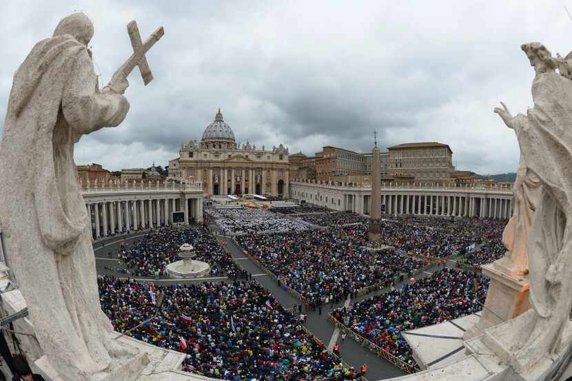 A crowd gathers for the canonization mass of Popes John XXIII and John Paul II on St Peter's...