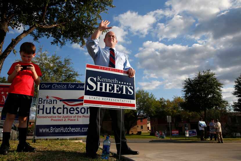 State Rep. Kenneth Sheets, the Republican incumbent in District 107, greets early voters...